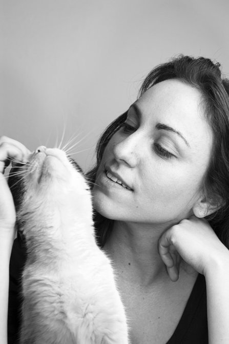 Content woman with her cat